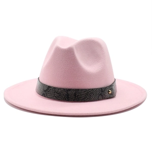 Pink wide brim wool fedora hat with snake pattern leather band and gold stud detail