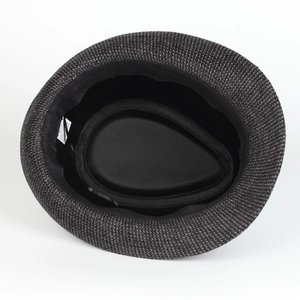 Detail shot of trilby hat interior featuring black sweatband and 80% polyester fabric label