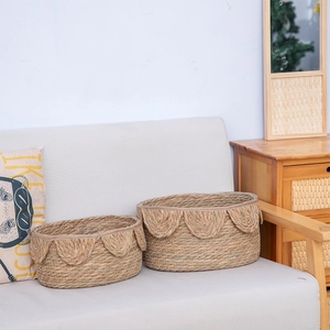Handcrafted Nordic woven rattan storage baskets with elegant petal wave edges set of 2