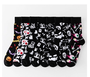 Detailed flat lay of 8 Halloween socks featuring pumpkin, skull, and ghost prints