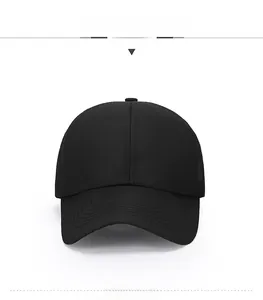 Close-up of black breathable mesh baseball cap with side triangle metal emblem detail