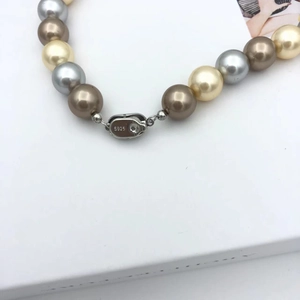 Detail of multi-color pearl necklace with S925 sterling silver buckle and hallmark