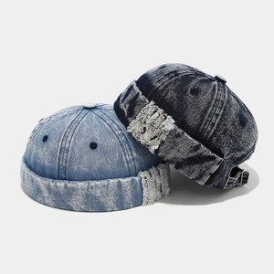 Vintage washed denim docker hat for men and women with adjustable metal strap and distressed detail