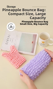 Close-up of pink and purple elastic bubble storage bag with high stretch pineapple texture