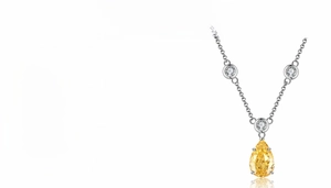 Macro detail of S925 silver necklace featuring 4ct yellow pear-cut carbon diamond stone