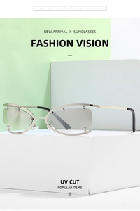 Detail of silver hollow metal frame and grey UV protective lenses on Y2K sunglasses