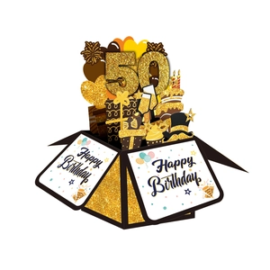 3D pop-up 50th birthday card in black and gold with cake, balloons and champagne icons