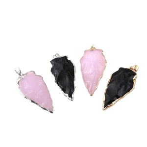 Arrowhead crystal pendant set in pink and black stone with gold or silver metal plating