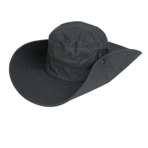 Detailed macro view of black quick-dry sun hat with mesh vents and side metal snaps
