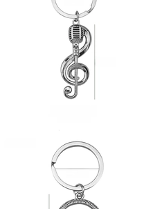 Close-up of silver musical note and microphone keychain with 25mm ring and 50mm charm