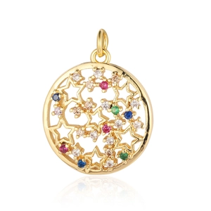 Detailed macro view of a gold circular star pendant with colorful inlaid gemstones