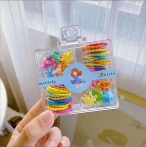 Kids hair accessories set including colorful mini clips and elastic bands in sweet baby box