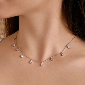 Elegant S925 sterling silver collar necklace featuring multiple teardrop zircon pendants