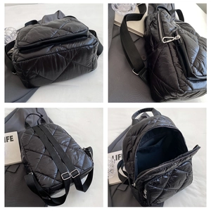 Detailansicht des schwarzen Stepprucksacks mit Innentaschen und Doppelreißverschluss