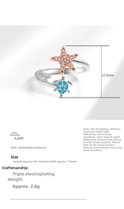Detail showing the 17.8mm wide sea turtle and starfish open ring with micro-paved cubic zirconia