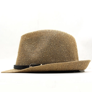 Detail of woven fedora hat with metallic shimmer and thin black leather buckle band