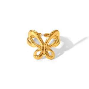 Detailed view of adjustable golden hollow butterfly open ring in stainless steel