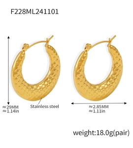 Macro detail of U-shaped gold earrings with grid texture and 29mm height measurements