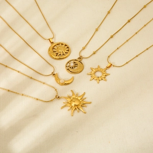 Set of 18k gold plated stainless steel necklaces featuring sun and moon pendants