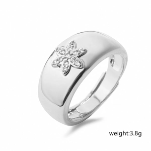 Macro view of geometric silver open ring with six-petal flower zircon inlay and 3.8g weight