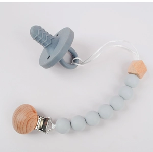 Detailed view of silicone pacifier with grey beads and octagonal beech wood beads
