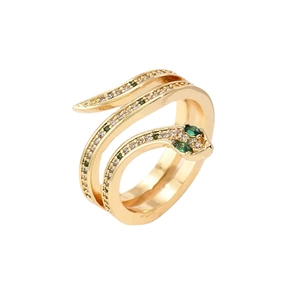Golden snake ring with green zircon eyes and white crystal inlay on white background