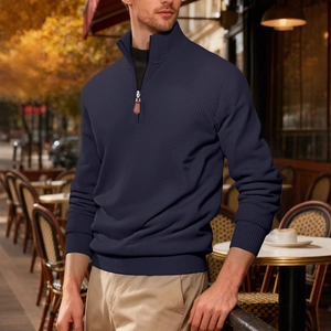 Men's navy blue half-zip corduroy sweatshirt with a stand collar and ribbed texture