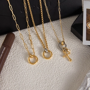 Classic 18K gold and silver two-tone stainless steel layered necklace set with round charms