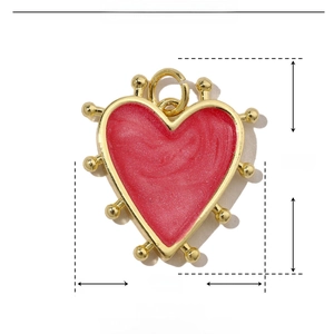 Detail view of red enamel heart dice pendant with gold copper trim and size specs