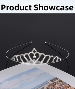 Macro shot of silver crystal bridal crown showing intricate heart patterns and rhinestones