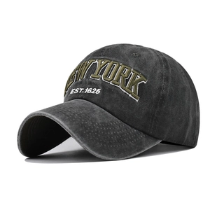 Close-up of vintage washed cotton baseball cap with New York EST.1625 embroidery details