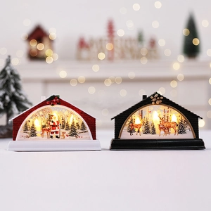 Christmas lanterns with LED lights featuring Santa and reindeer for festive tabletop decor