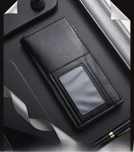 Detail view of black leather wallet interior featuring transparent ID window and card slots