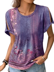 Detail of purple floral t-shirt featuring cold-shoulder cutouts and tied sleeve accents
