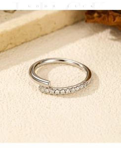 Detailed close-up of S925 sterling silver ring with shimmering row of small pavé stones