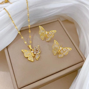 Parure de bijoux papillon en or avec collier et boucles d'oreilles sertis de zircons