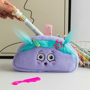 Detail of purple furry monster pencil case showing large capacity for colorful pens