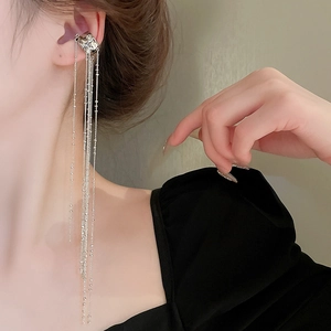 Elegant silver long chain tassel C-shaped ear cuff for non-pierced ears on a model