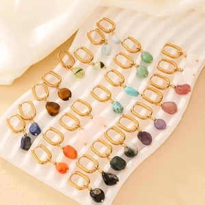 Elegant gold earrings with irregular natural stones like turquoise and malachite stones