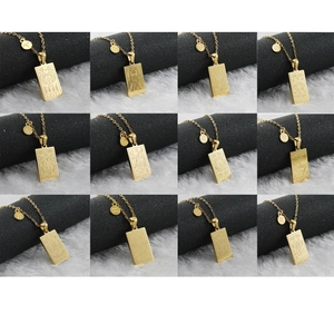 Detailed collection of 12 gold zodiac pendant necklaces on square stainless steel plates