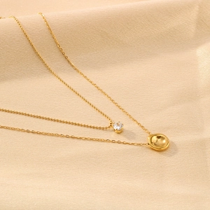 Double layer stainless steel gold necklace with diamond pendant and crater charm details