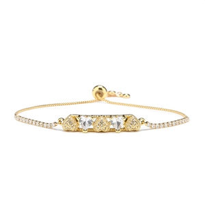 Adjustable gold heart bracelet with cubic zirconia stones and tennis chain design