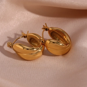 Chic 18K gold plated stainless steel chunky dome hoop earrings on champagne silk