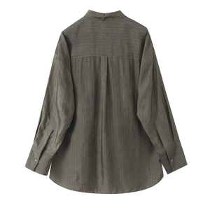 Back view of a casual greyish brown striped long-sleeve shirt for women with pocket detail