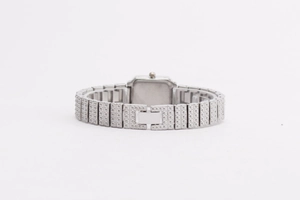 Detailed back view of a silver square women's watch with textured link strap and buckle