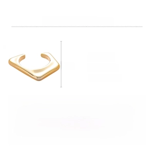 Detail showing gold irregular geometric triangle cuff dimensions and polished ABS finish