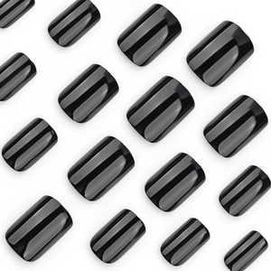 Glossy black square press-on nails set with shiny mirror finish on white background