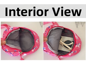 Detail view of pink unicorn kids bag interior with a smooth zipper and grey fabric lining