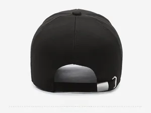 Adjustable back view of black baseball cap with metal buckle and twill cotton texture