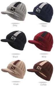Winter knit hats with visors and fleece lining shown in six versatile assorted colors